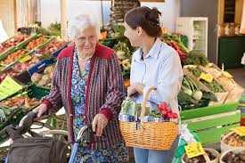 Caregiver helping with grocery shopping